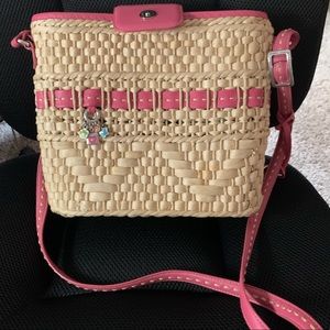 Brighton straw handbag trimmed and lined in pink.